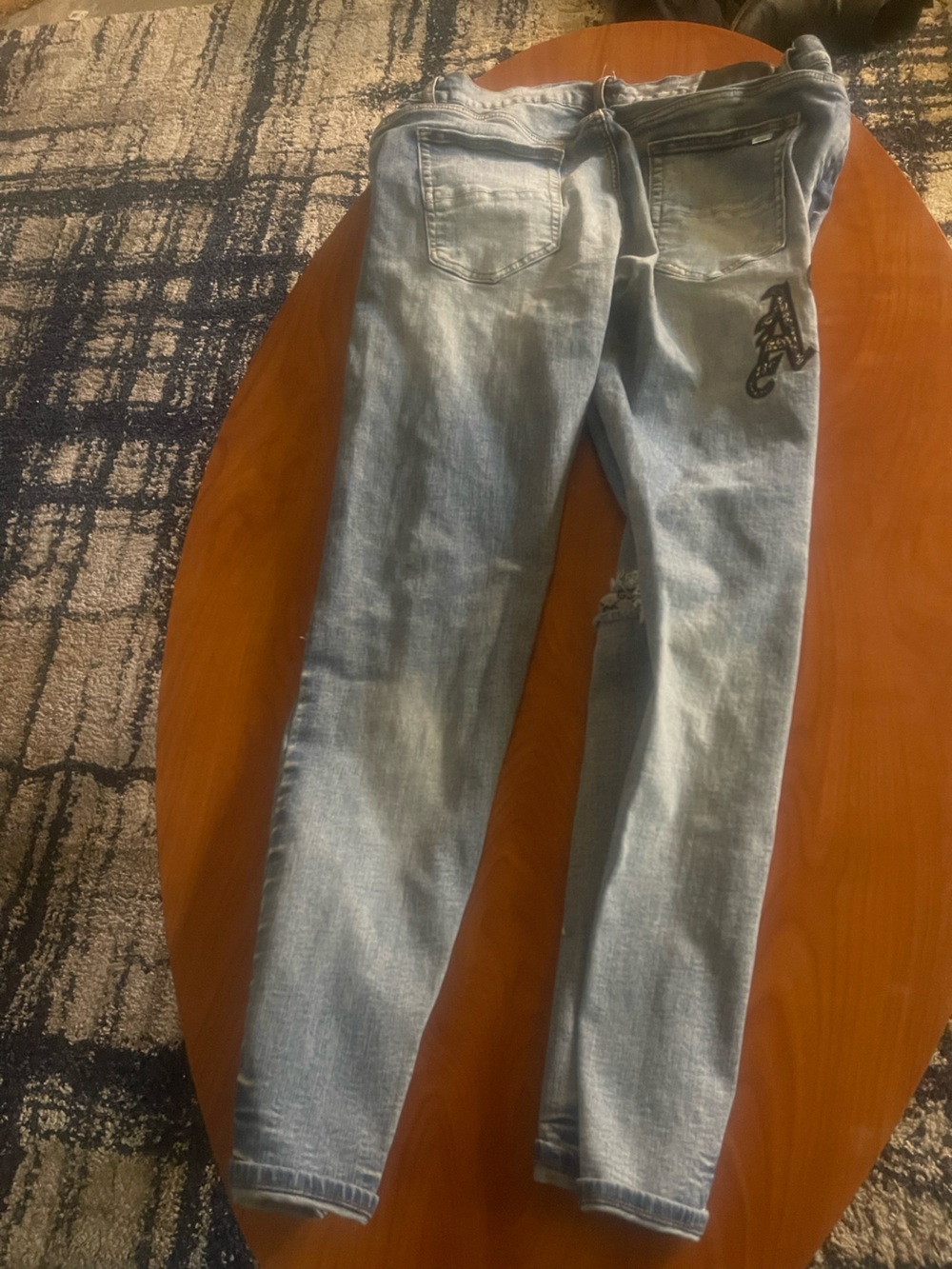 AMIRI Light Blue Distressed Denim Jeans with Patchwork - Picture 8 of 10